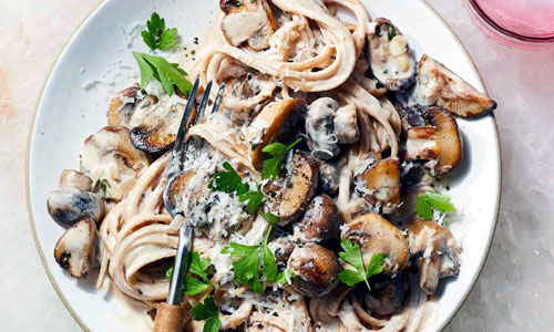 A freshly served plate of rich and savory Mushroom Cream Linguine